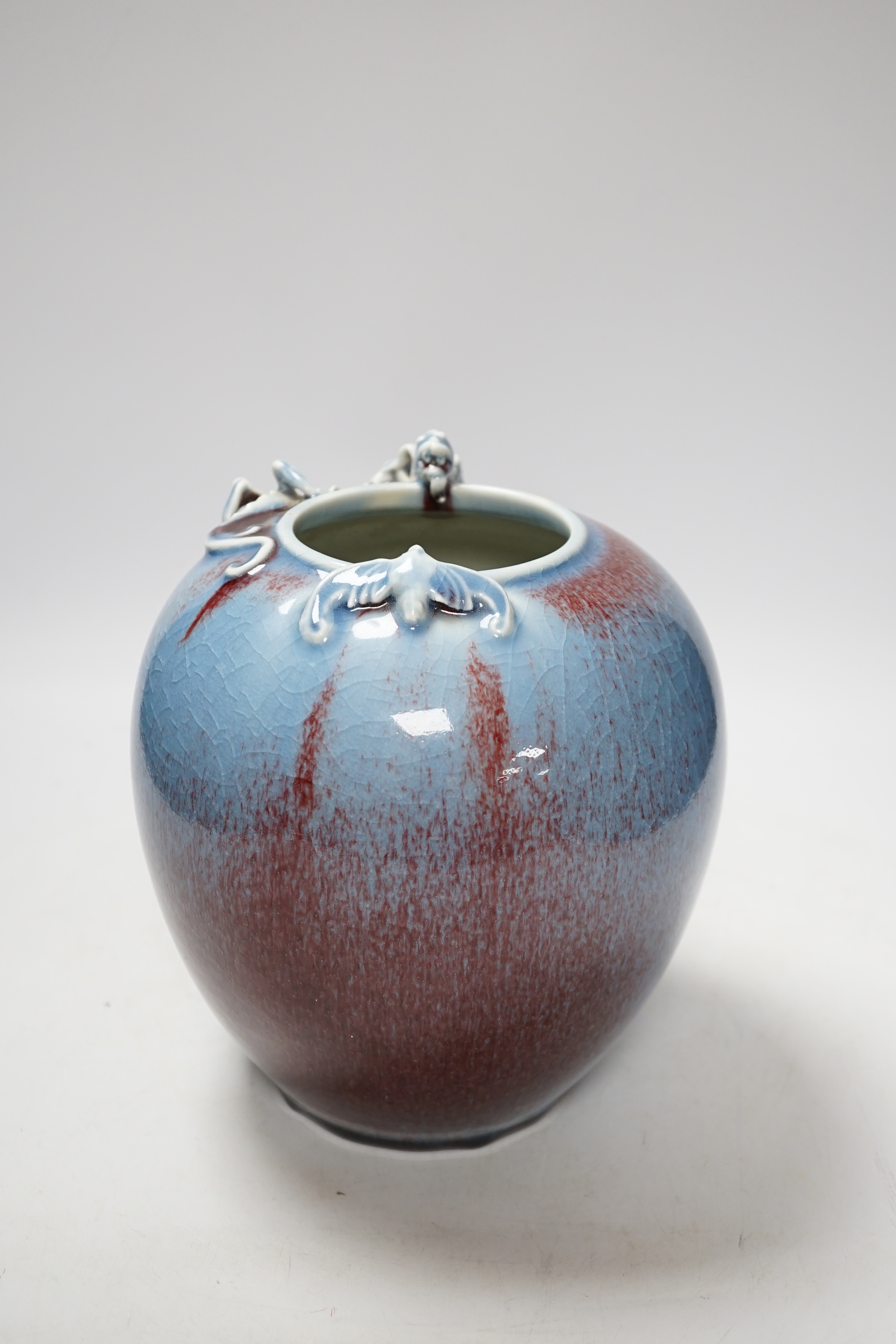 A Chinese crackle glaze ‘dragon’ vase, 21cm